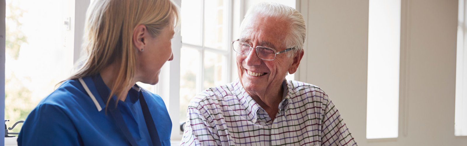 woman and senior smiling
